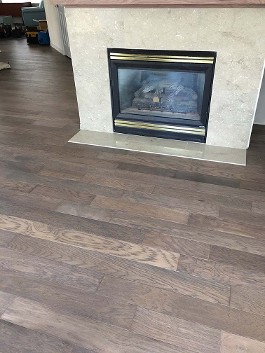 Wood Flooring in Front of Fireplace